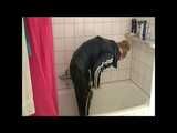Get 2 Videos of a nice woman from our 2008 Archive enjoying her shiny nylon Rainwear at home