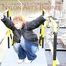 An archive girl tied and gagged on a stair rail wearing a jeans and a shiny down jacket (Pics)