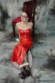 Bound in red PVC dress