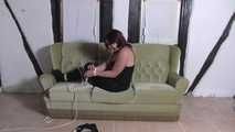 Aurora roped on couch 2/2