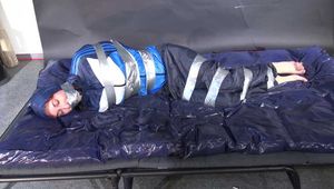 Myxxxy bound and gagged in shiny nylon Rainwear trying to free herself