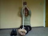Tied bare feet