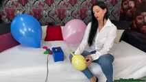 sexy preparing U16 balloons with electrical pump and popping them