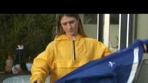 Get 2 Videos with Katharina in her shiny nylon Rainwear from our Archives