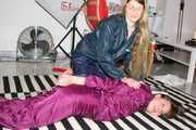 Watching sexy Alina being tied and gagged on the floor from Katharina both wearing sexy shiny nylon rainwear combinations (Pics)