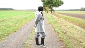 Unser neues Model Miss Amira in Regatta Nylon und tranparentem Regenanzug gefesselt und geknebelt
