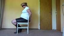 Cuffed on a chair 002