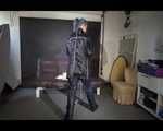Watching Mara wearing sexy black rainwear during sorting her ropes for the next bondage session (Video)