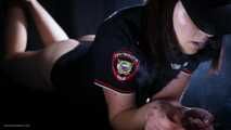 Police woman is smoking 3 strong reds in the studio