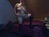 In long patent-leather boots ...