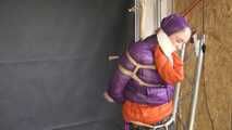 Rachel Adams bound, gagged and double hooded in shiny downjackets