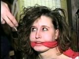 24 YEAR OLD ERICA IS MOUTH STUFFED, CLEAVE GAGGED, ROPE GAGGED & BALL-TIED WITH BLACK ELECTRICAL TAPE ON THE FLOOR (D51-16)