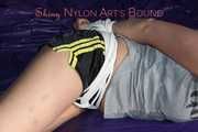 Pia being tied and gagged on a sofa with ropes and a cloth gag wearing a sexy shiny nylon shirts and a tshirt (Pics)