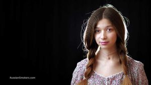 Really sexy babe Irina showing her smoking skills with a 120mm Cigaronne