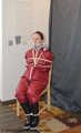 Lady Nadja hard bound and multiple gagged in AGU rainwear