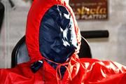 Katharina tied and gagged in shiny nylon rainwear