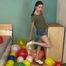 stomp2pop the balloons with her clogs shoes