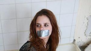 Anna tied up with tape PICS