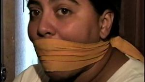 24 YR OLD LATINA HOUSEWIFE IS OTM GAGGED, WRITES RANSOM NOTE WITH HANDS TIE, MOUTH STUFFED, CLEAVE GAGGED, MAKES RANSOM CALL, STRUGGLES & IS HANDGAGGED (D64-11)