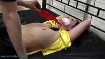 Nina heavyly cuffed to the bed