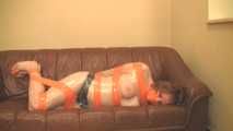 [From archive] Stella - mummified topless in cling film and hogtaped (video)