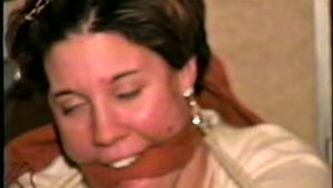 20 Yr OLD WAITRESS IS BALL-TIED, CLEAVE GAGGED, BLINDFOLDED & HANDGAGGED (D40-5)