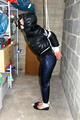 Julia tied and gagged in down jacket (cellar)