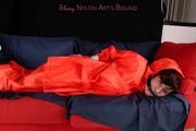 Julia tied and gagged by Alina in heavy raingear