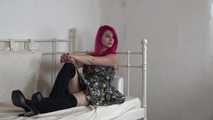Lana tied with towels on bed