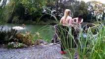 Fur coat and rubber boots - naked in the park