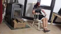 Aurora try to get free on chair 