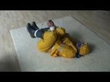03:20 Min. video with Katharina bound in a yellow rainsuit