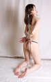 Cleavegagged topless barefoot Jessica, hogtied with hemp rope