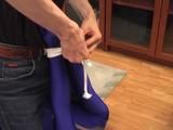 Gina in blue Lycra catsuit