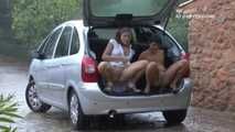 041004 Susana & Leticia Shelter In The Car To Pee Out The Rear Hatch.