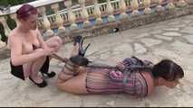 The Spain Files - Yvette Costeau challenged by Rija Mae - Outdoor Hogtie in the Sun