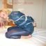 One of our beautiful archive girls in an blue rain suit tied and gagged in bed (pics)