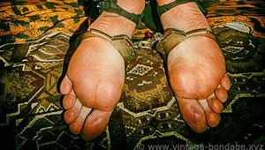 Klava in hancuffs and legirons