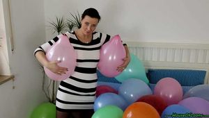 bed full of balloons