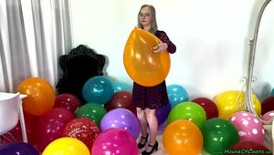 balloon stress test with nails, lighter and stick