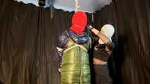 Sebastien with his hands tied behind his back in a puffer winter jacket.