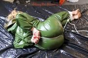 Sophie ties and gagges herself on bed wearing a beautiful green PVC catsuit (Pics)