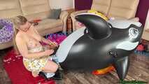 overinflate various pool toys until they burst and sign them