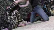 Minuit - Tied to a Package in public