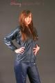 Alina posing in a studio wearing a supersexy darkblue rainwear combination (Pics)