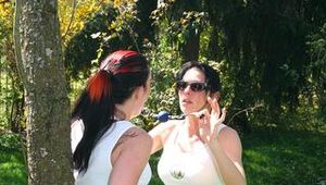 Jill tied and gagged by her friend in shiny nylon shorts