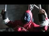 Watch 3 Archive Videos with Katherina enjoying Bondage in her shiny nylon Rainwear from 2010