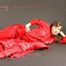 Alina posing infront of a camera wearing sexy red shiny nylon rainwear (Pics)