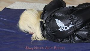 Nina tied and gagged in a shiny downjacket and rainpants