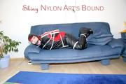 Jill tied and gagged wearing shiny nylon oldschool downwear (Pics)